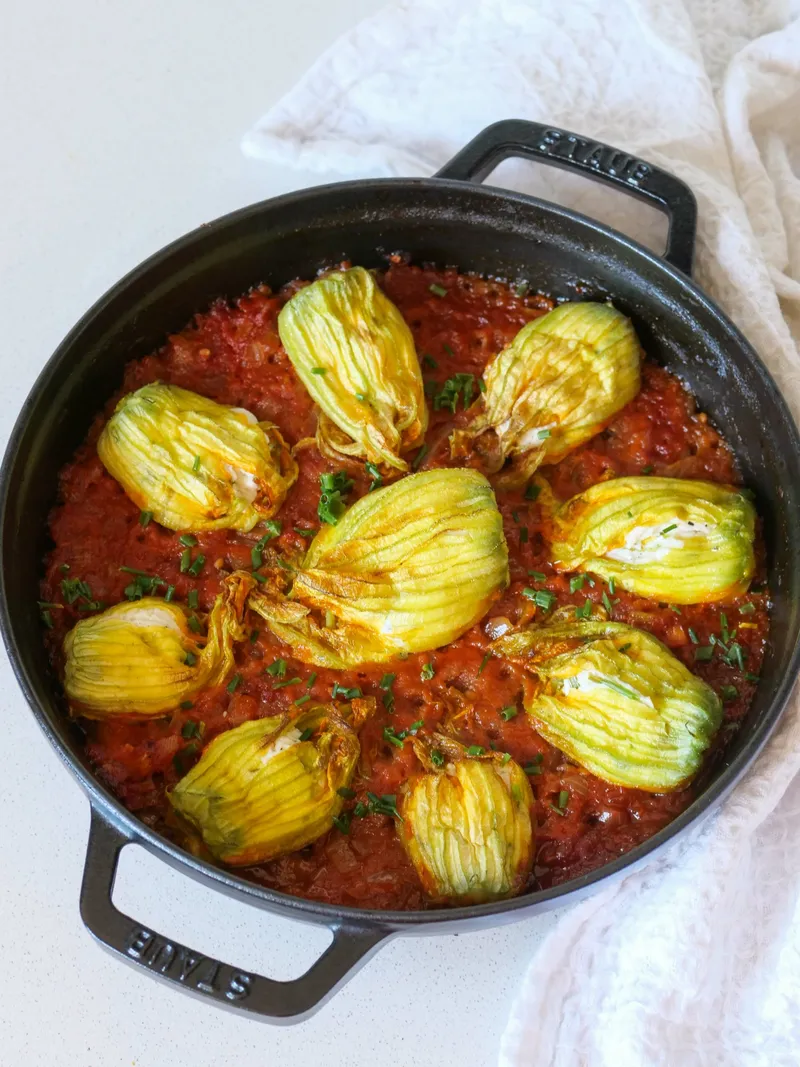 Fleurs de courgettes farcies à la ricotta gratinées au four