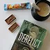 Derelict de Nolwenn Moon accompagné de la barre chocolatée Merveilles du Monde : une lecture pleine de surprises