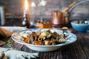 Sauté de veau aux olives, carotte et champignons