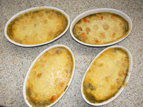 Cassolette de noix de saint jacques aux epinards apres cuisson