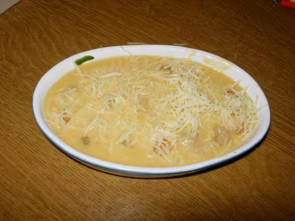 Cassolette de noix de saint jacques aux epinards avant cuisson