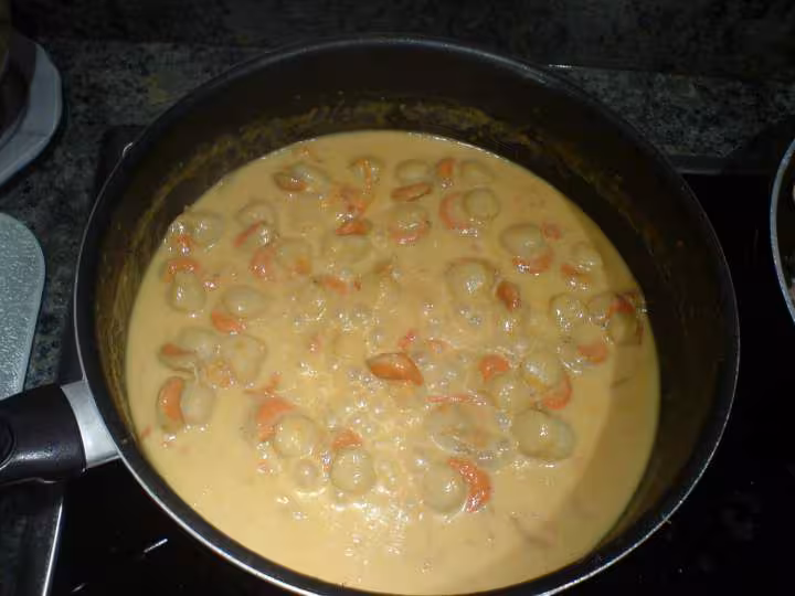 Curry de saint jacques au coco en pleine cuisson