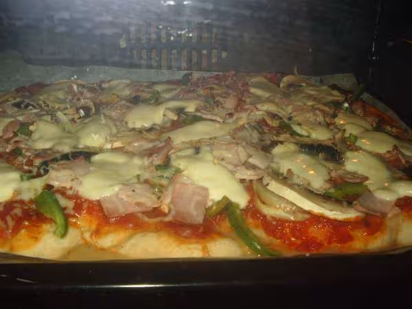 Pate a pizza dans le four