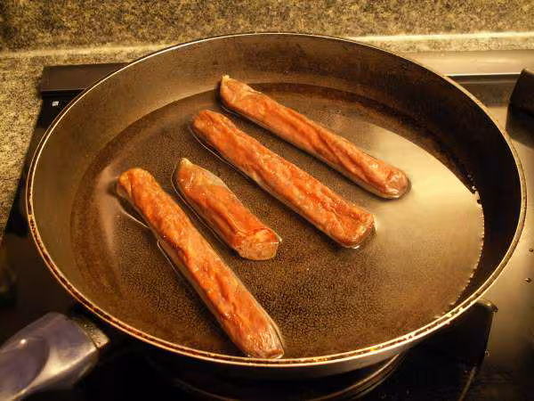 Cuisson des saucisses chinoises debut