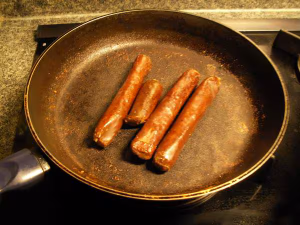 Cuisson des saucisses chinoises fin