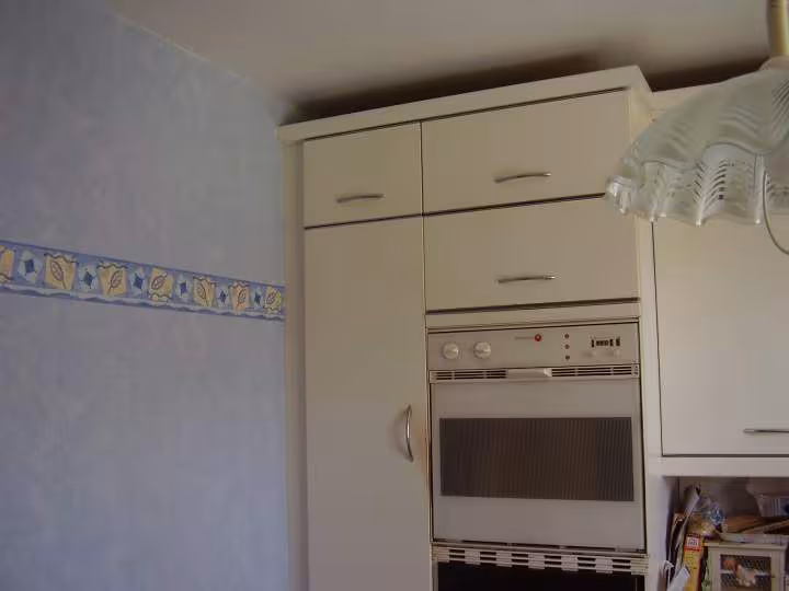 Tapisserie de la cuisine cote bleu frise