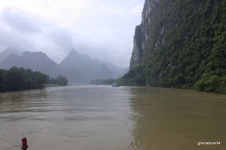 Croisiere sur la riviere li reputee pour la peche aux cormorans