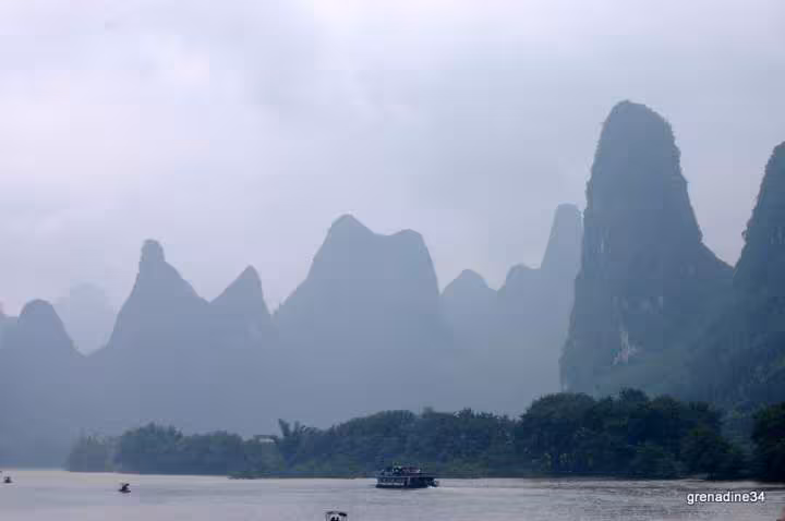 Croisiere sur la riviere li reputee pour la peche aux cormorans