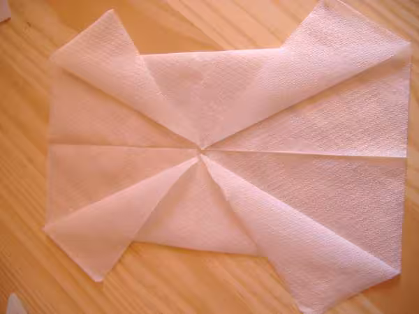 Etapes pliage serviette papillon