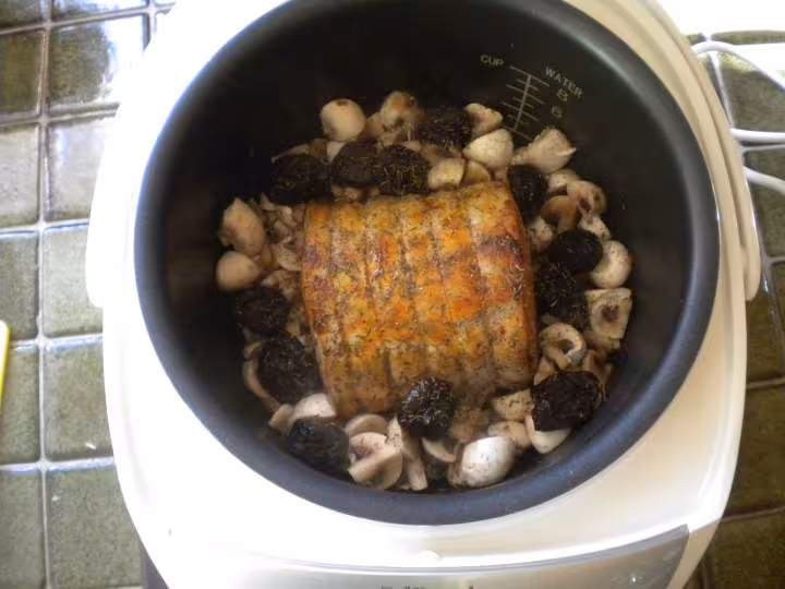 Roti porc champignon pruneaux pommes