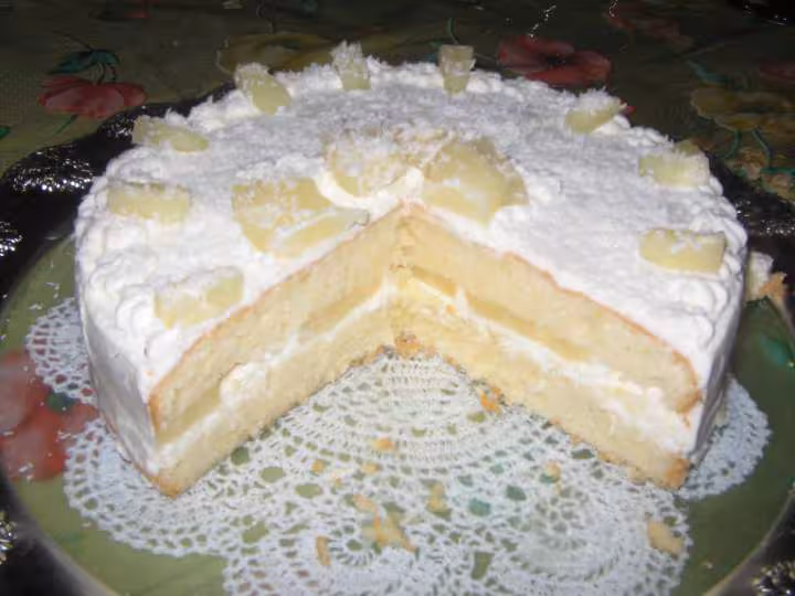 Gateau ananas et noix de coco coupe