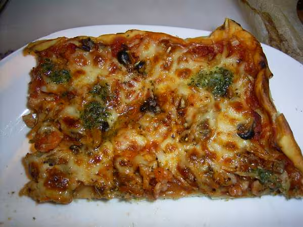 Pizza aux fruits de mer et sa persillade
