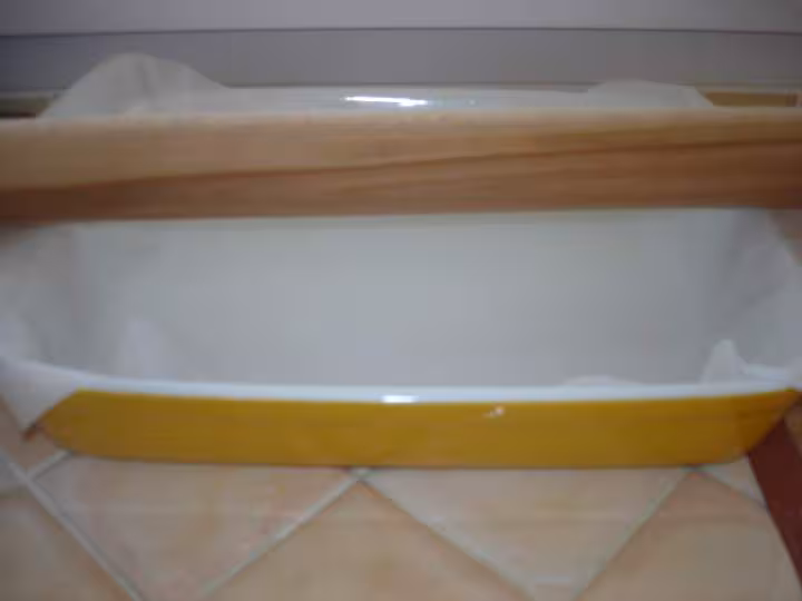 Couvrir un plat a gratin de d 1 feuille sulfurisee
