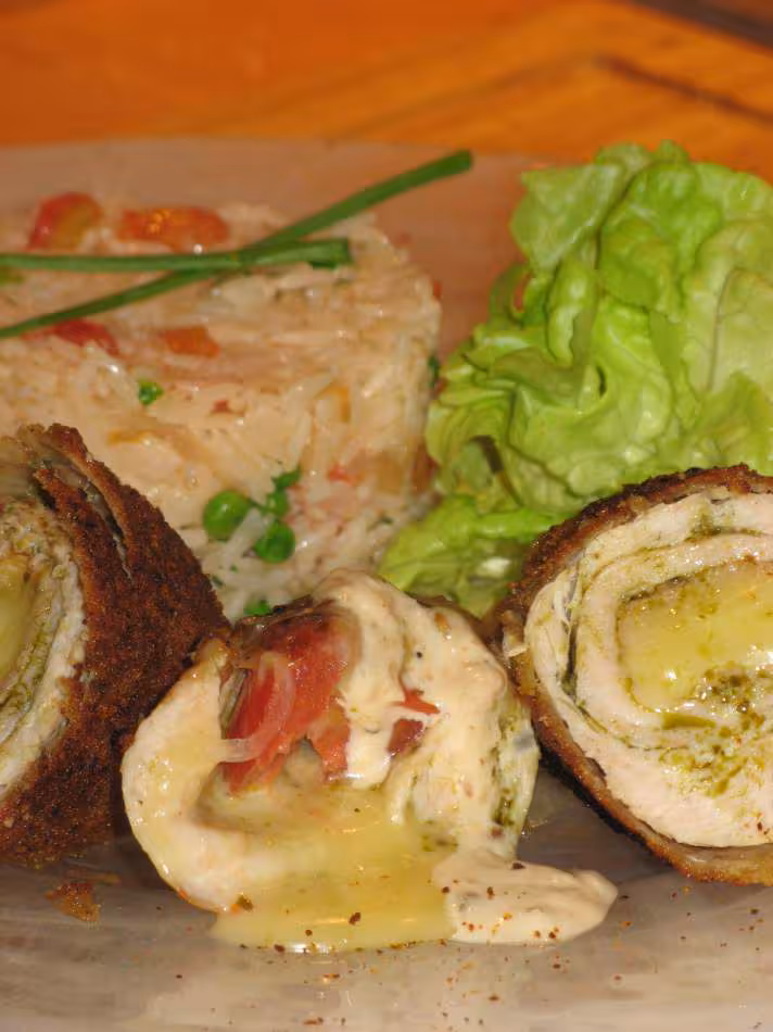 Roule de dinde au jambon tomate et fromage a raclette