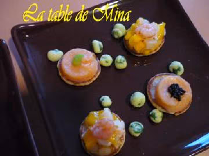 Tartare de saint jacques a la mangue et mousse de saumon sur blinis