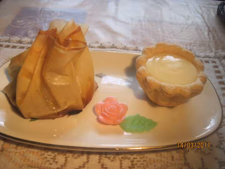 Aumonieres au pomme et mangue caramelisees