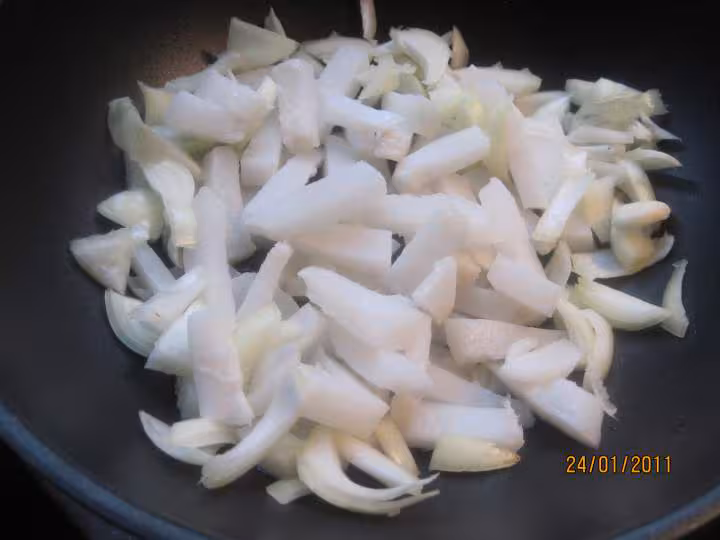 Blanc de calamars aux legumes en sauce vin