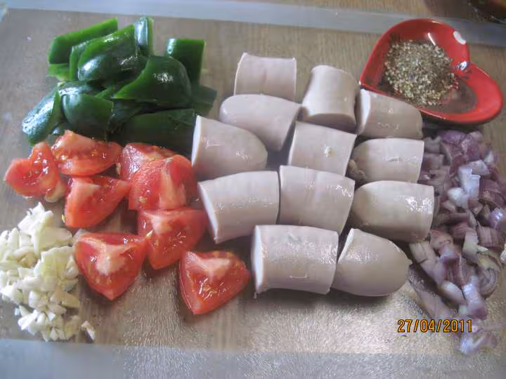 Boudins blancs aux legumes en sauce tomate