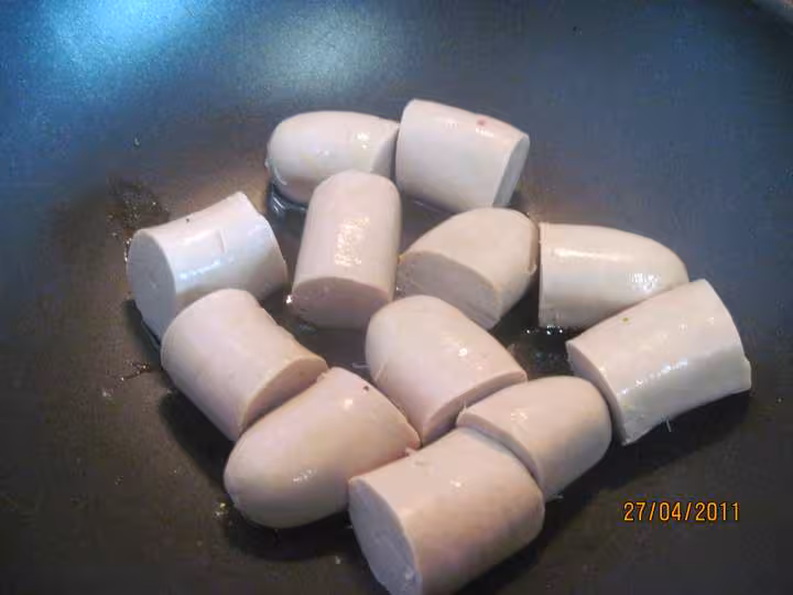 Boudins blancs aux legumes en sauce tomate