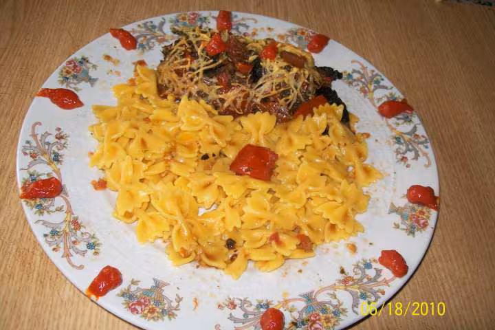Champignons aux des de tomates gratines
