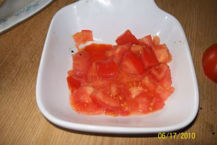 Champignons aux des de tomates gratines