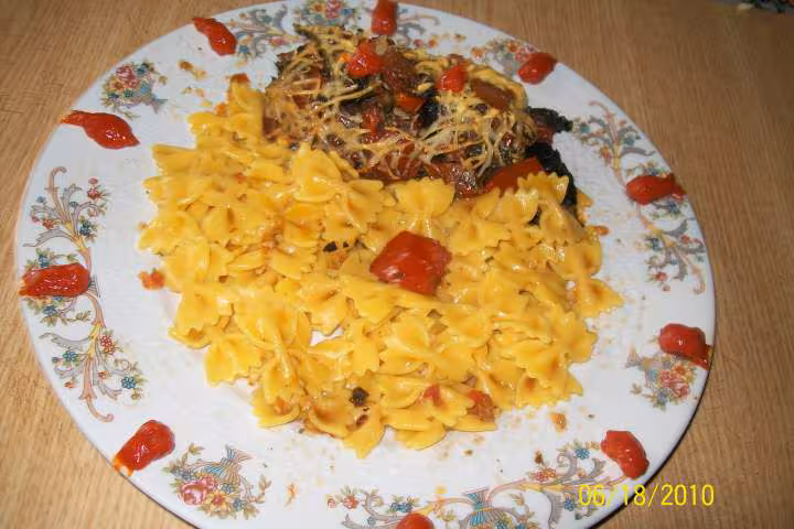 Champignons aux des de tomates gratines