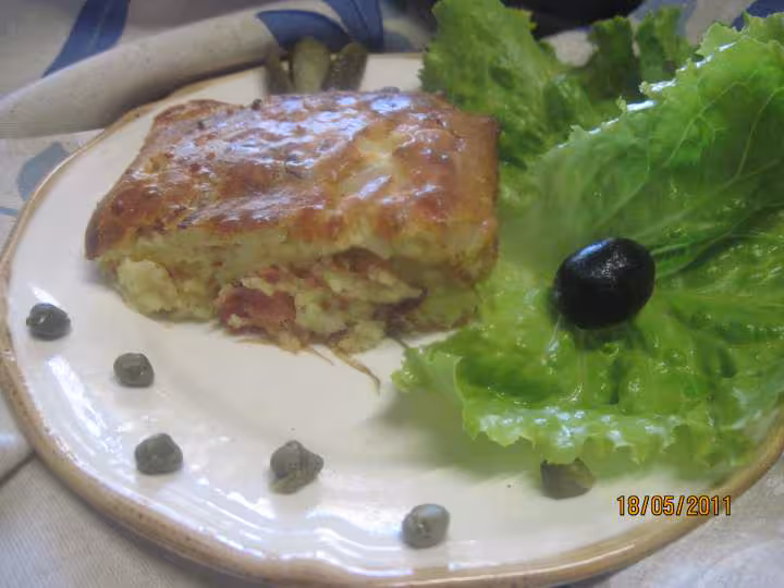 Clafoutis sale au jambon cru et gruyere rape