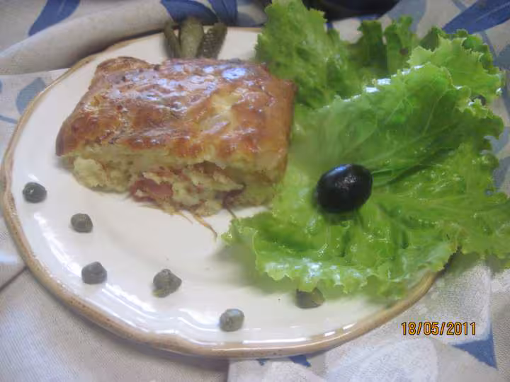 Clafoutis sale au jambon cru et gruyere rape