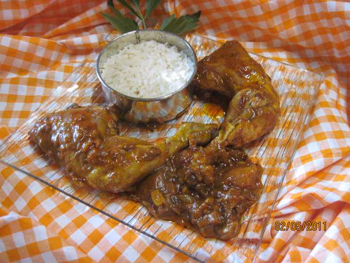 Cuisses de poulet en sauce tomate