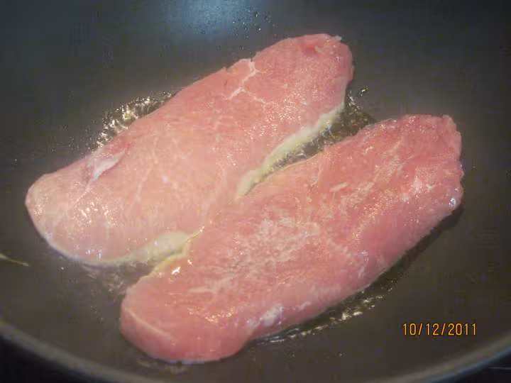 Escalopes de porc a la sauce rose aux olives