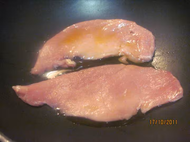 Escalopes de porc aux champignons a la creme fraiche