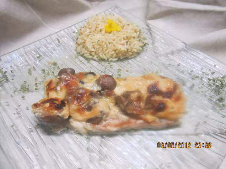 Escalopes de porc gratinees sauce bechamel champignons