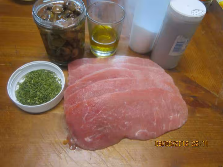 Escalopes de porc gratinees sauce bechamel champignons