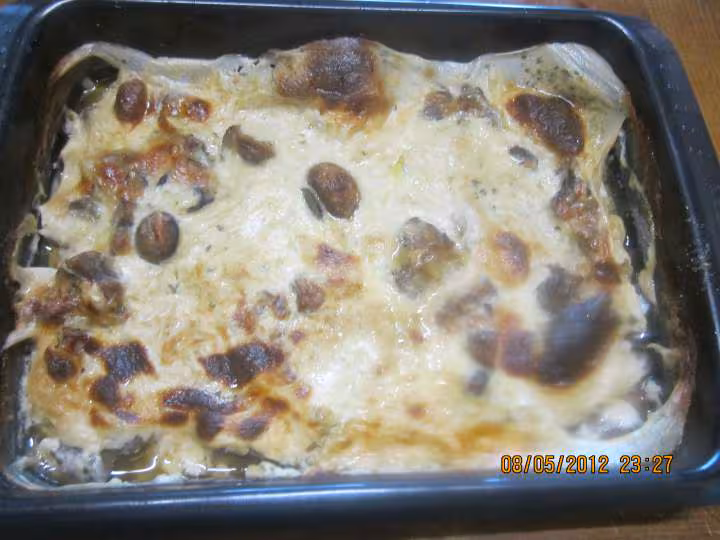 Escalopes de porc gratinees sauce bechamel champignons
