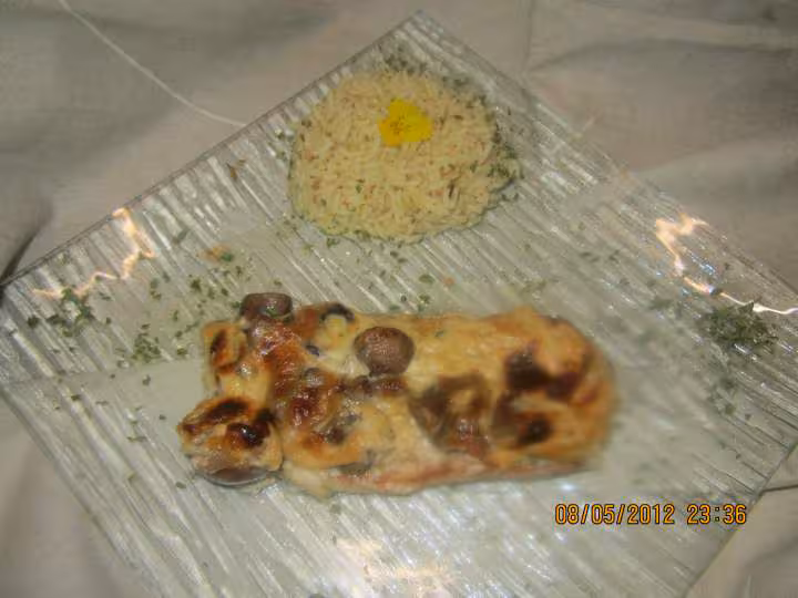 Escalopes de porc gratinees sauce bechamel champignons