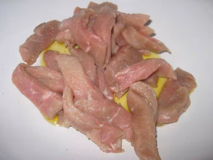 Escalopes de porc une poeles de legumes
