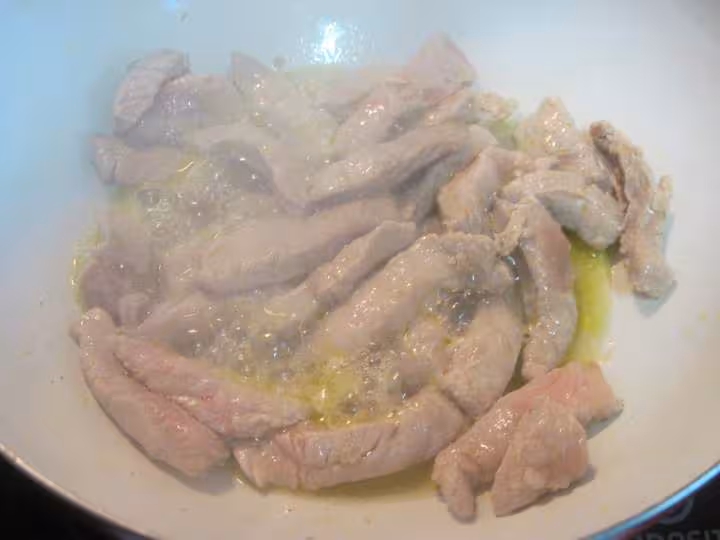 Escalopes de porc une poeles de legumes