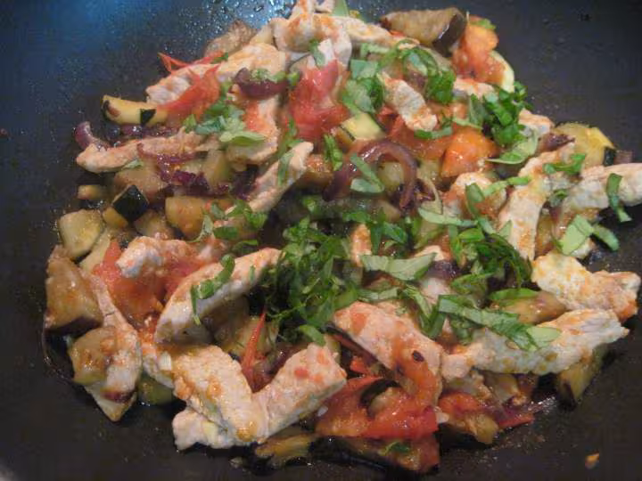 Escalopes de porc une poeles de legumes