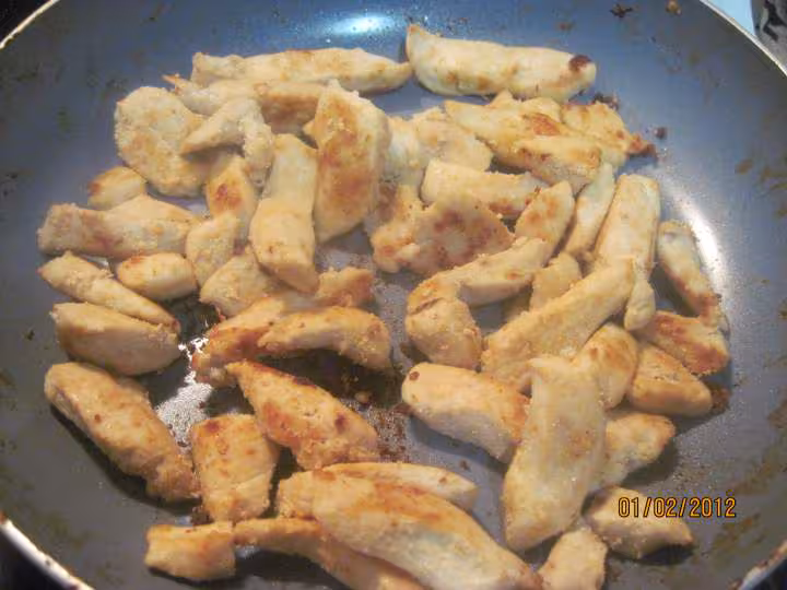 Escalopes de poulet aux courgettes en sauce tomate