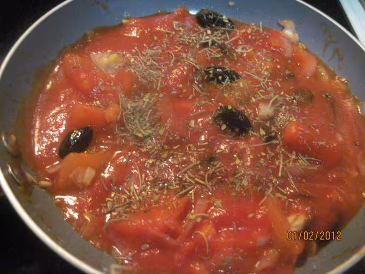 Escalopes de poulet aux courgettes en sauce tomate