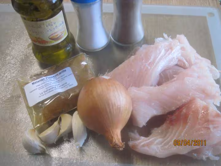 Filets de poisson aux legumes en sauce