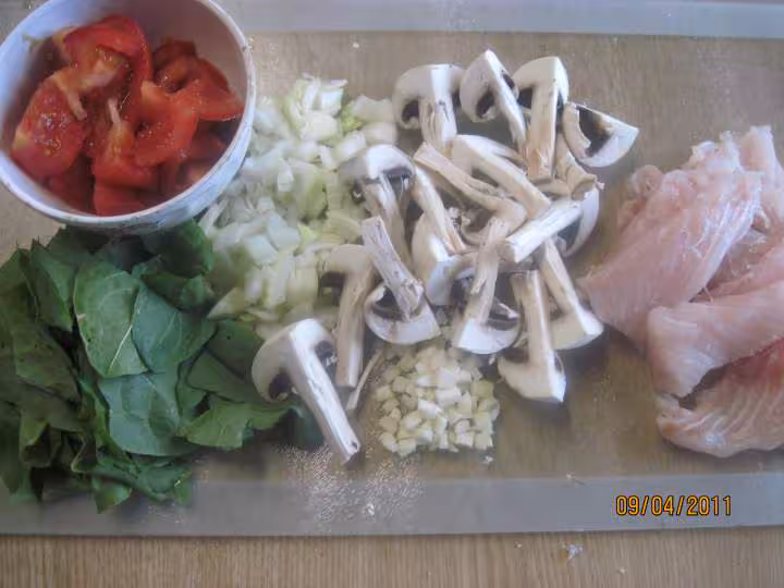 Filets de poisson aux legumes en sauce