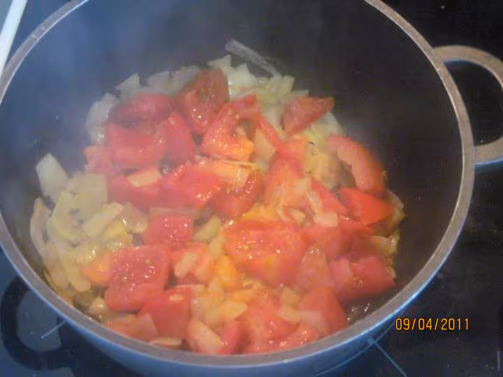 Filets de poisson aux legumes en sauce