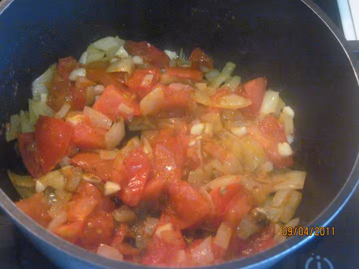 Filets de poisson aux legumes en sauce