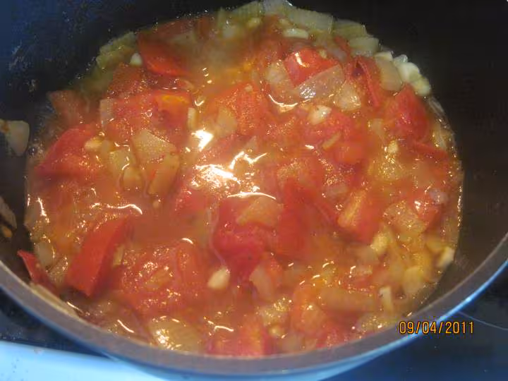 Filets de poisson aux legumes en sauce