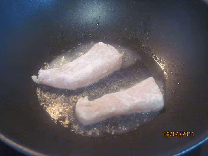 Filets de poisson aux legumes en sauce