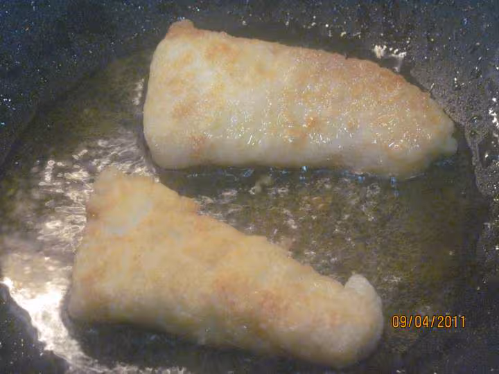 Filets de poisson aux legumes en sauce