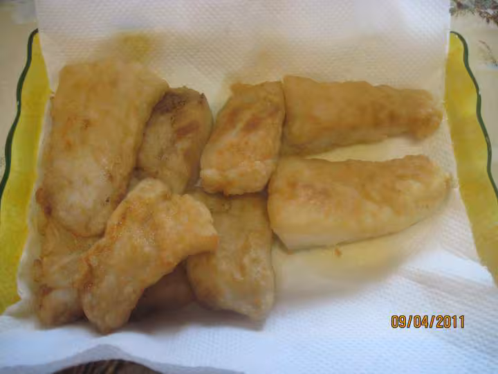 Filets de poisson aux legumes en sauce