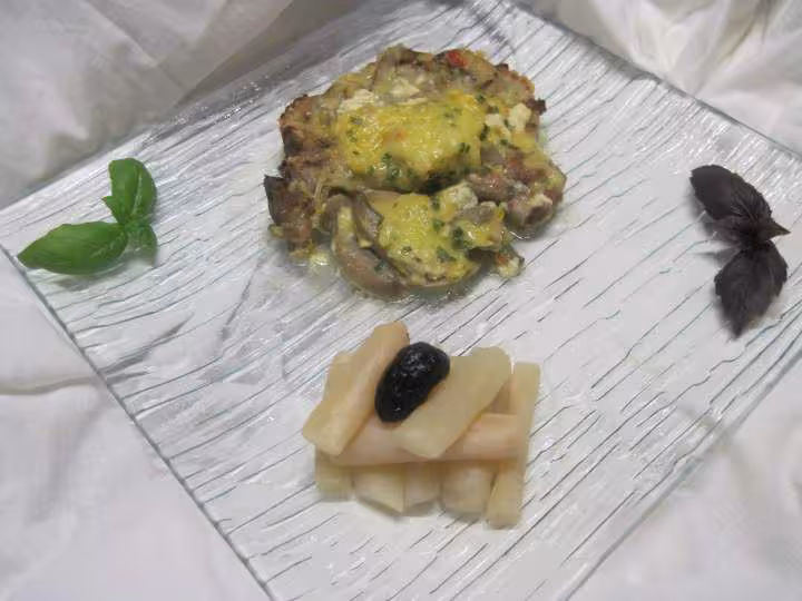 Gratin de cotelettes de porc et champignons