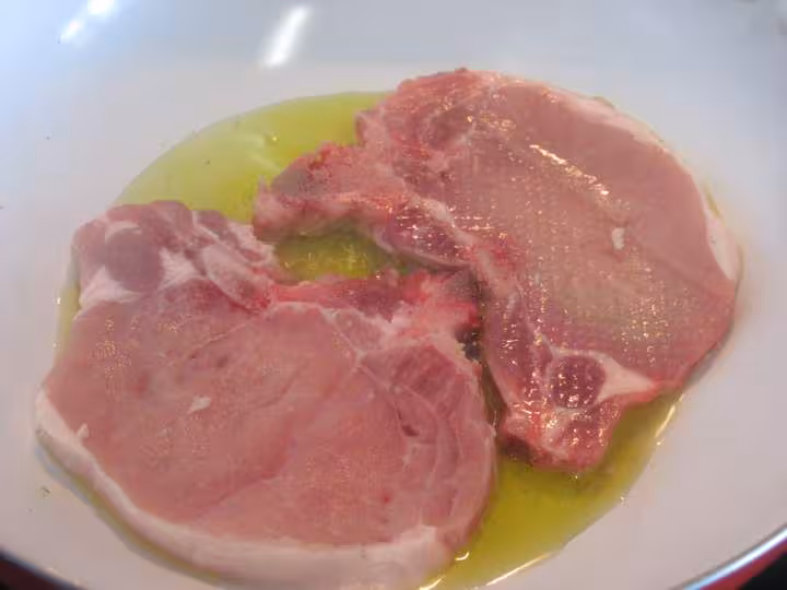 Gratin de cotelettes de porc et champignons
